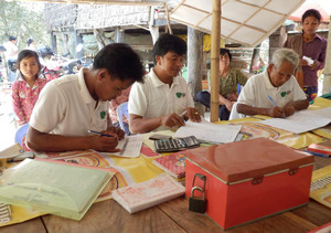 Bine talking with a farmer